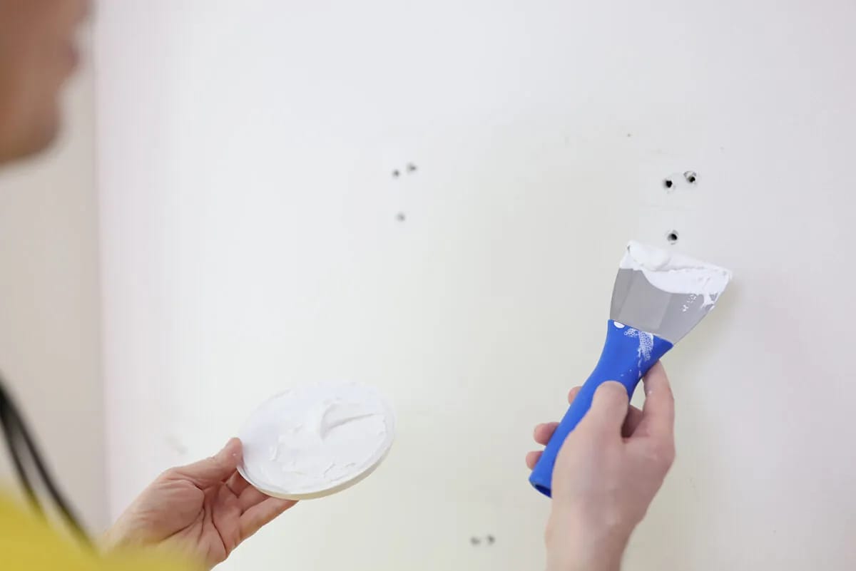 Wall patch repair and touch-up painting by Doha Home Fix, Doha Qatar